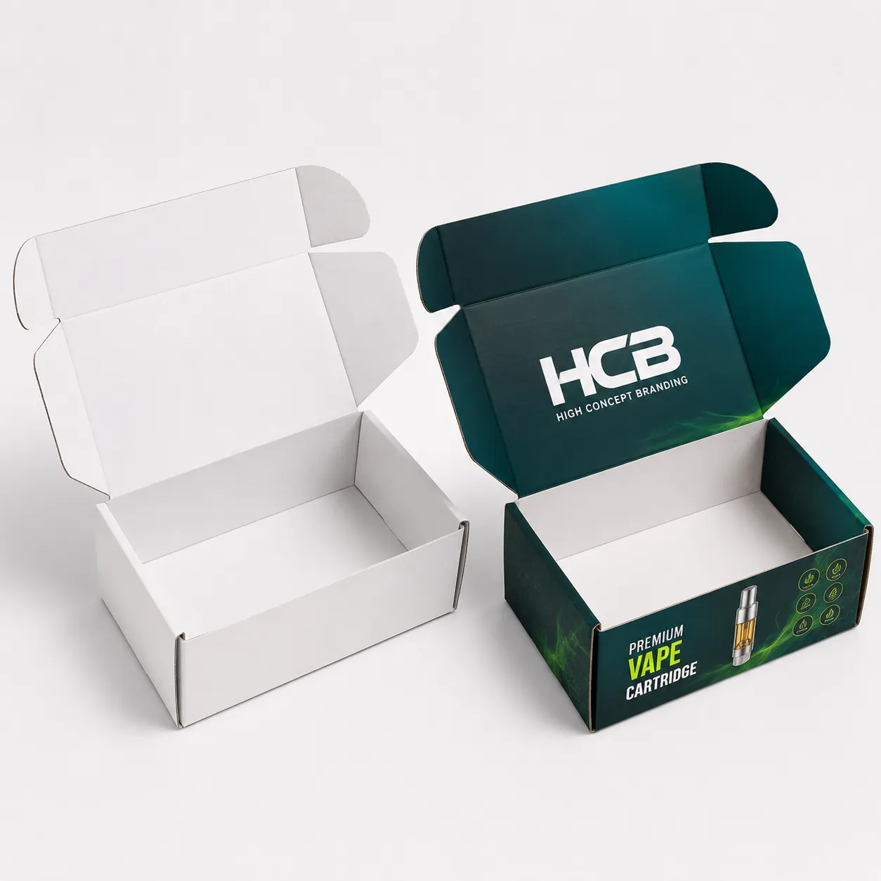 Custom printed corrugated mailer boxes for vape cartridges displayed alongside a plain white sample box. class=